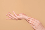 Hands demonstrating Juvederm's rejuvenation effect