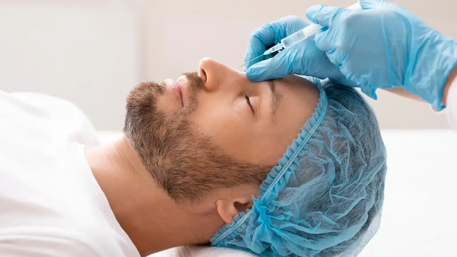 Man getting his nose injected.