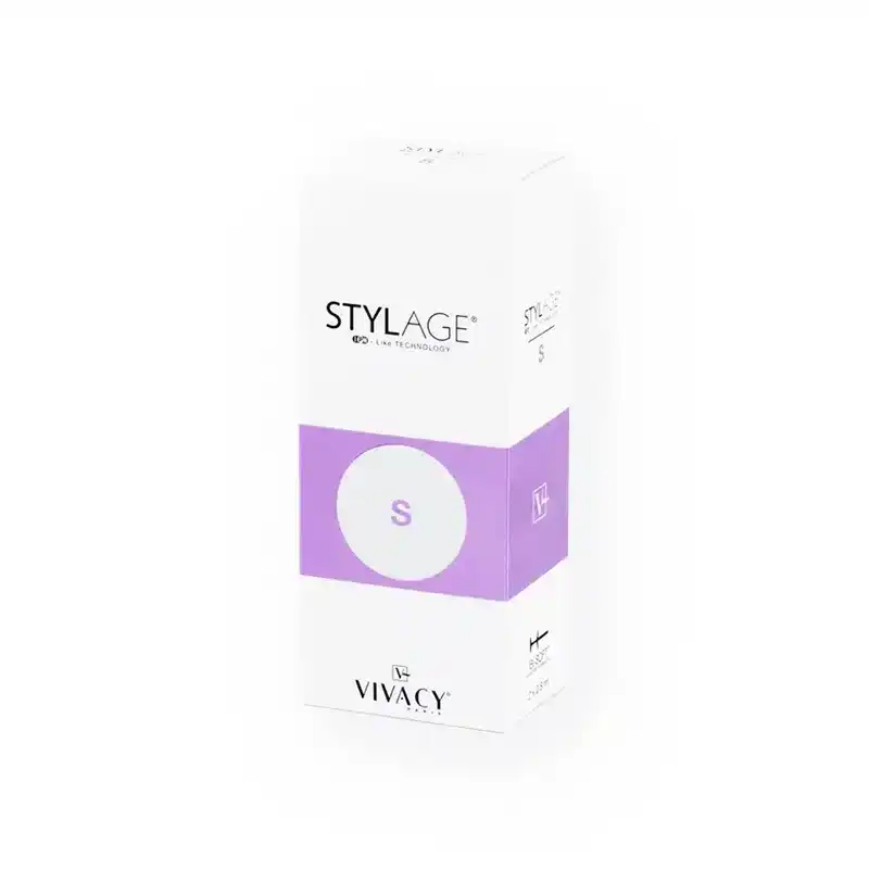 A white box of STYLAGE® S BI-SOFT® by Vivacy, featuring purple accents. The front text includes the product name "STYLAGE® S BI-SOFT®," along with a stylized "S" in a white circle set against a purple background. The word "Vivacy" is printed near the bottom.