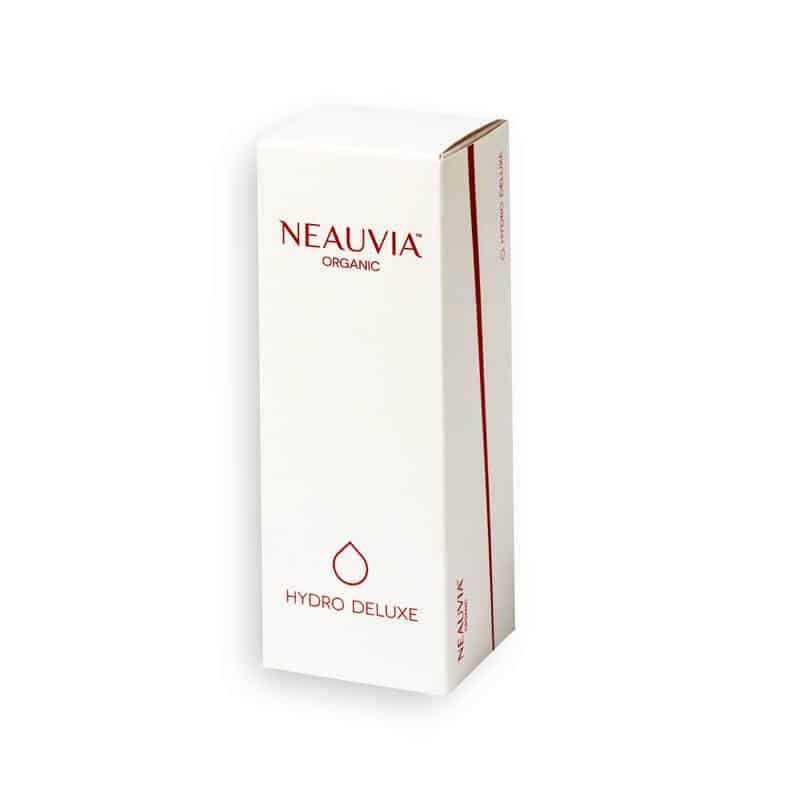 A white rectangular box with red text reads "NEAUVIA™ ORGANIC HYDRO DELUXE MAN" at the top and "Hydro Deluxe" near the bottom, along with a simple droplet icon. The box is slightly angled, showing a side with additional red text.